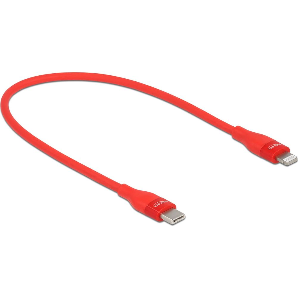 Un cable USB-C a Lightning rojo yace sobre fondo blanco.