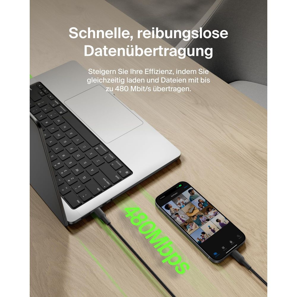 Laptop i smartfon połączone kablem. 480 Mbps.