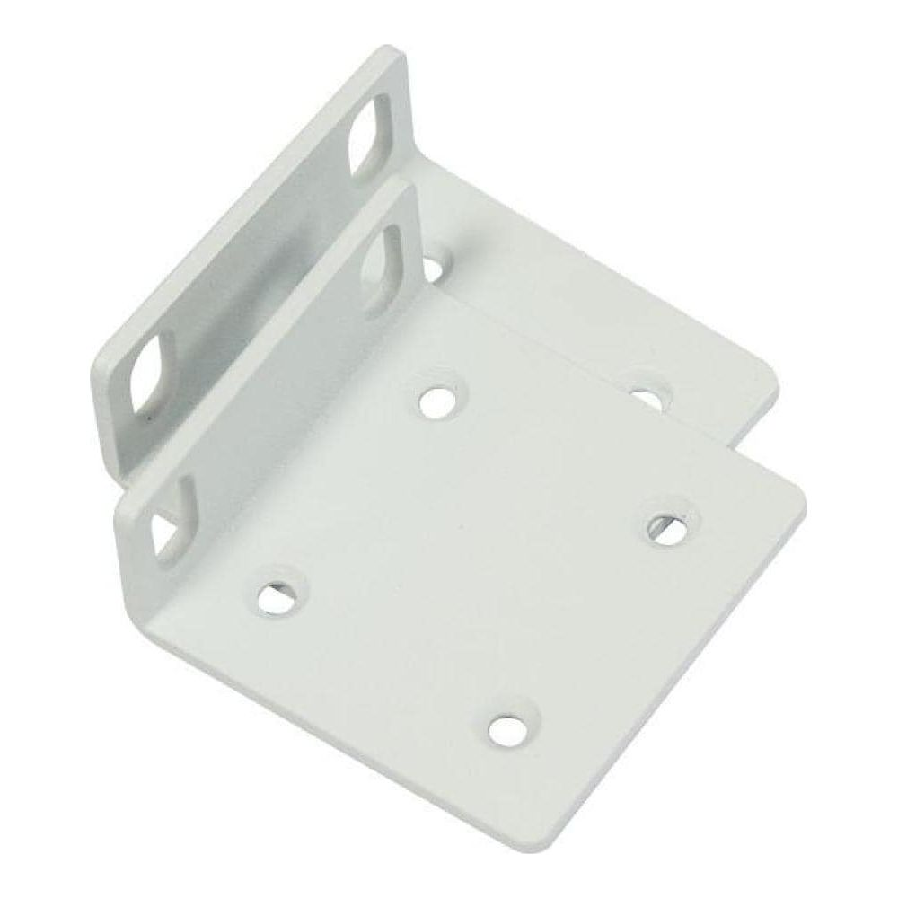 Dwa białe wsporniki narożne z owalnymi i okrągłymi otworami.