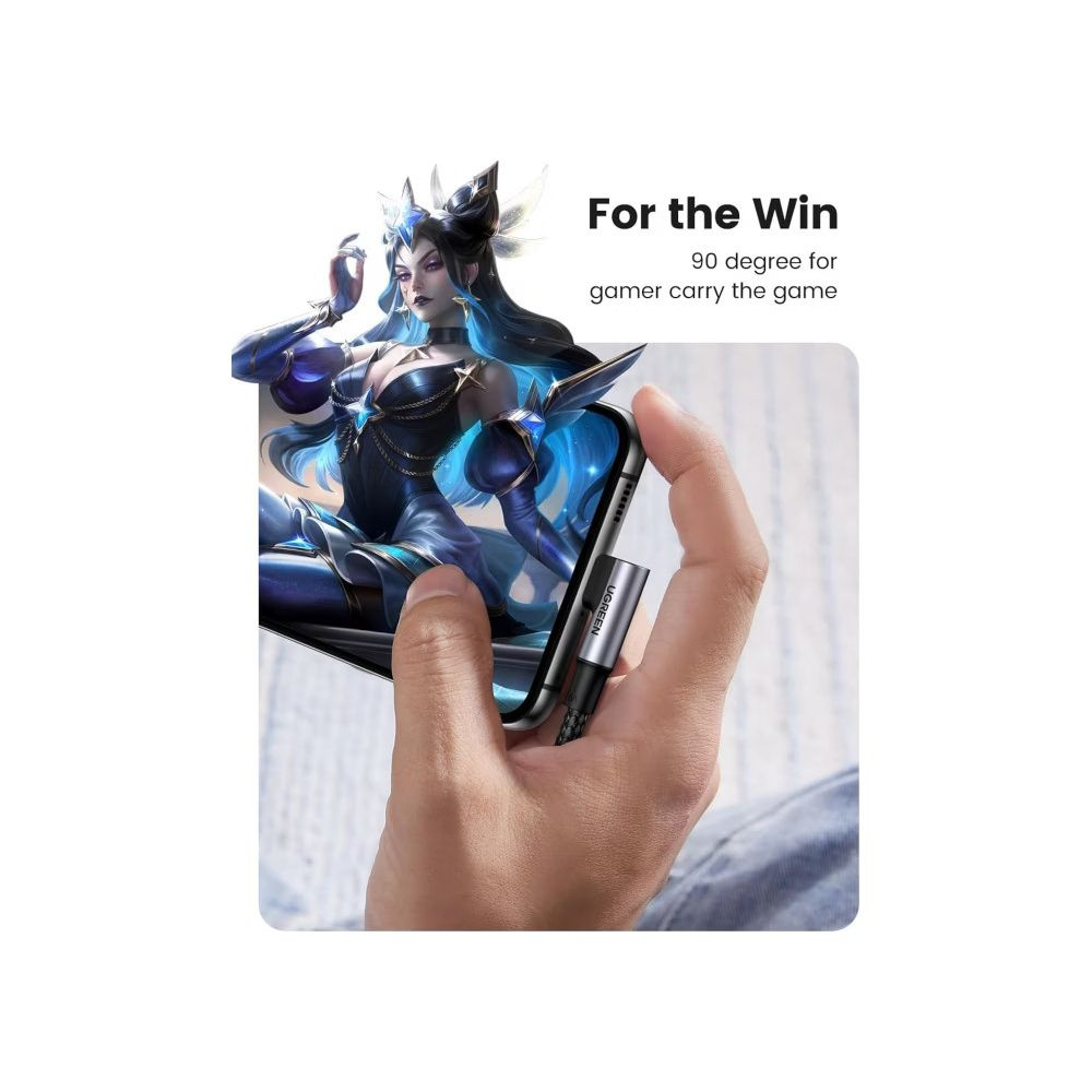 Telefon z postacią z gry, trzymany z adapterem 90 stopni.