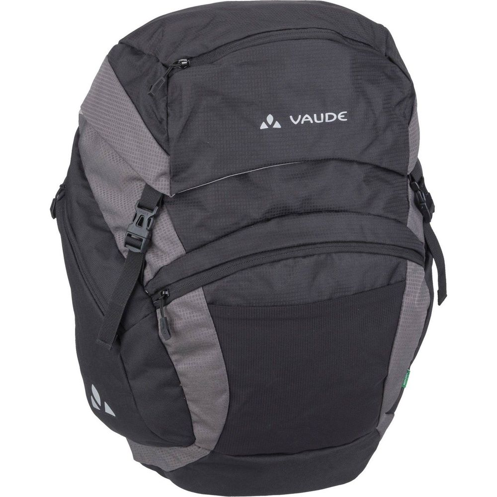 Szary i czarny plecak z logo Vaude, zamkami błyskawicznymi i klamrami.
