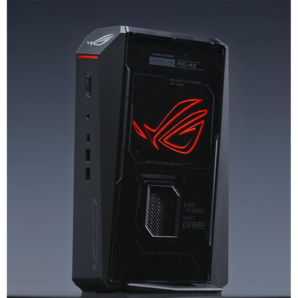 Ein schwarzer ROG NUC Computer mit rotem beleuchtetem Logo und Text.