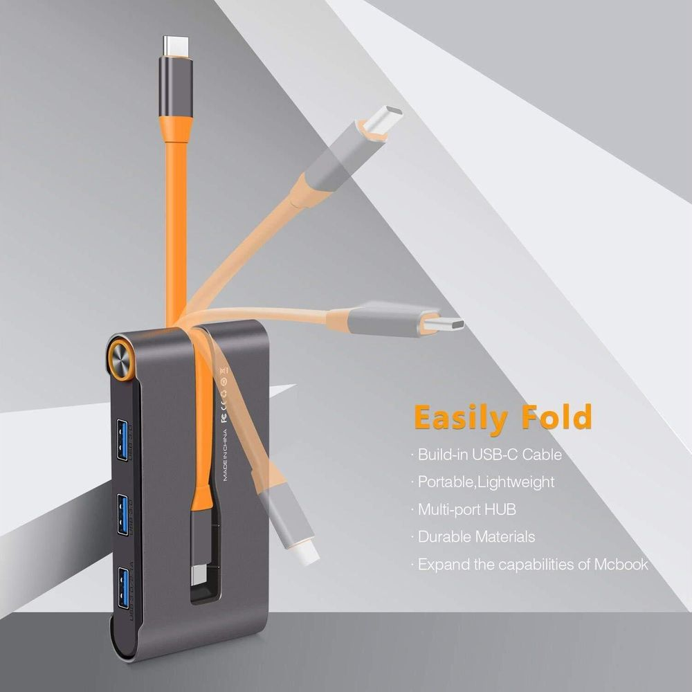 Hub USB-C grigio con cavo arancione pieghevole per portabilità.