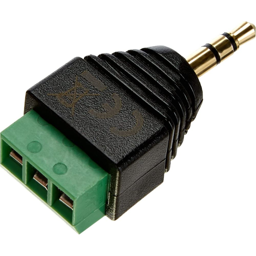 Czarny adapter jack 3,5 mm z zielonym złączem śrubowym. Detale na obudowie.