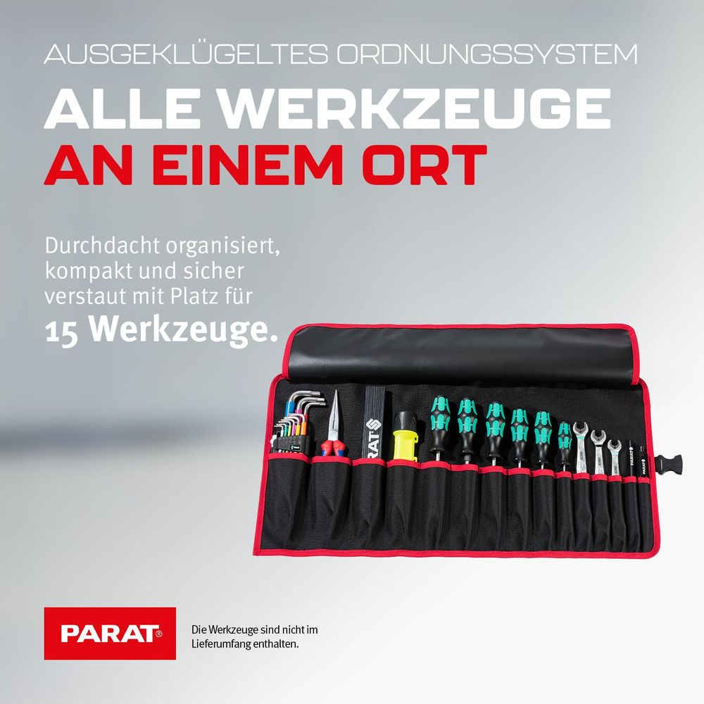 Rolka na narzędzia z różnymi narzędziami, takimi jak klucze i szczypce.