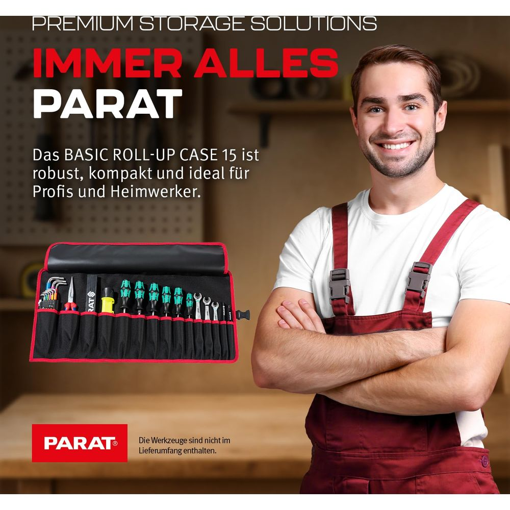 Mężczyzna w ogrodniczkach obok zwijanej torby na narzędzia z kluczami i bitami.