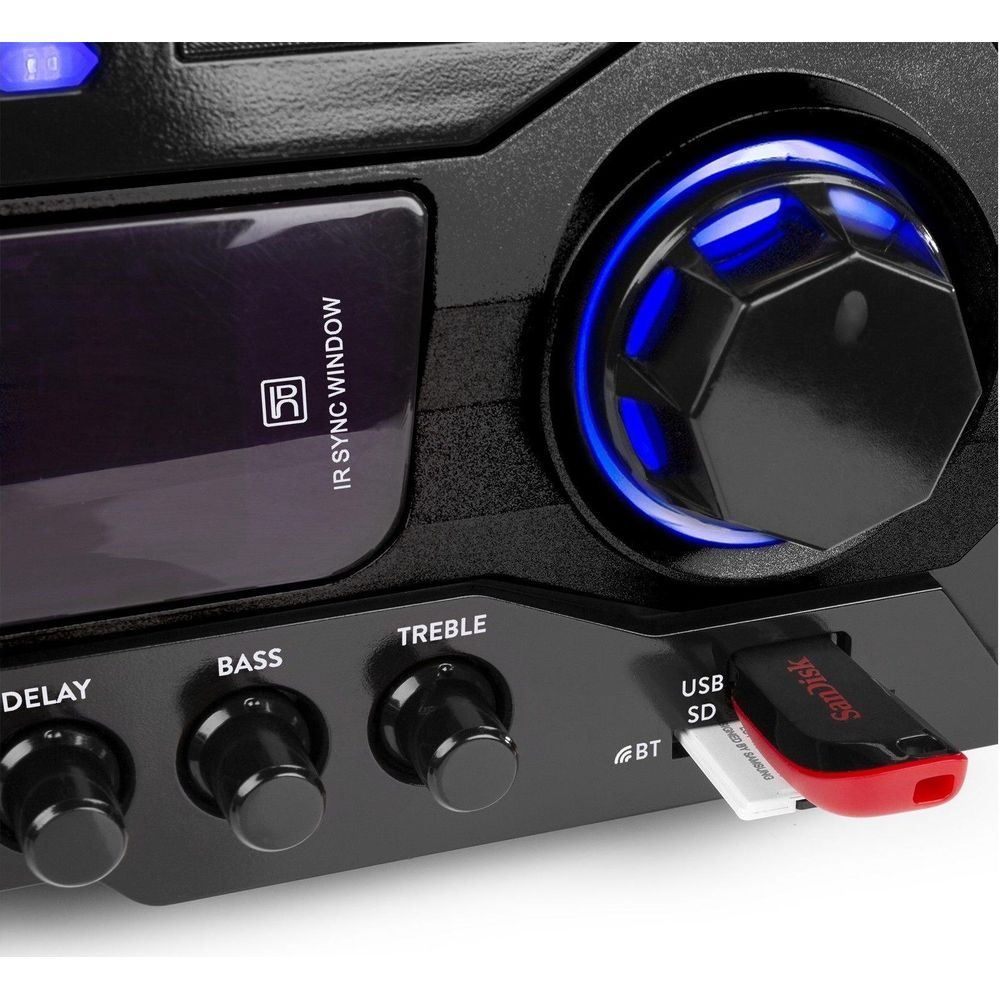 Ein schwarzes Audiogerät mit Knöpfen für Delay, Bass, Treble und einem leuchtenden blauen Knopf.