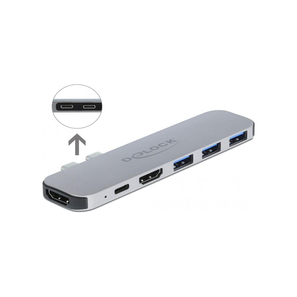 Silberner USB-C Hub mit HDMI, USB-Ports und SD-Kartensteckplätzen.