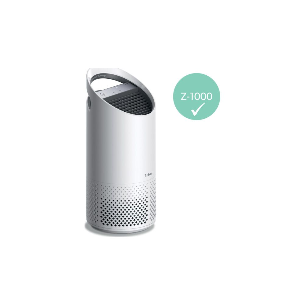 Biały oczyszczacz powietrza z srebrną rączką i górnymi otworami wentylacyjnymi.