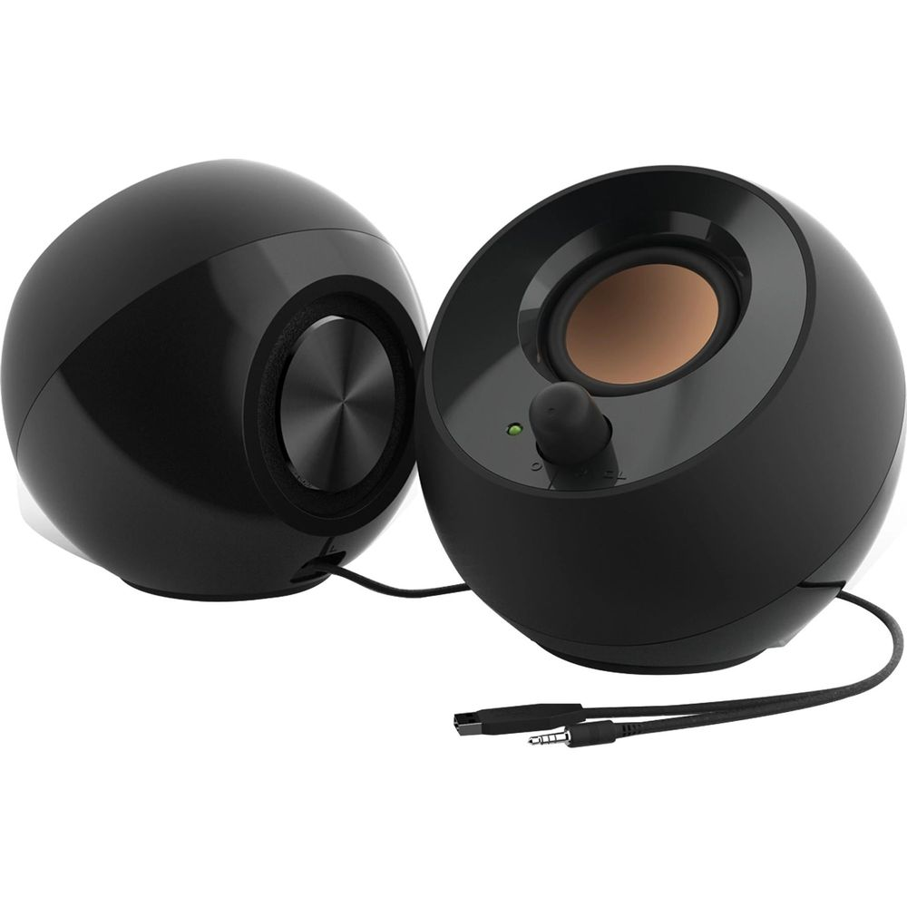 Dos altavoces esféricos negros con conos de cobre y cables.