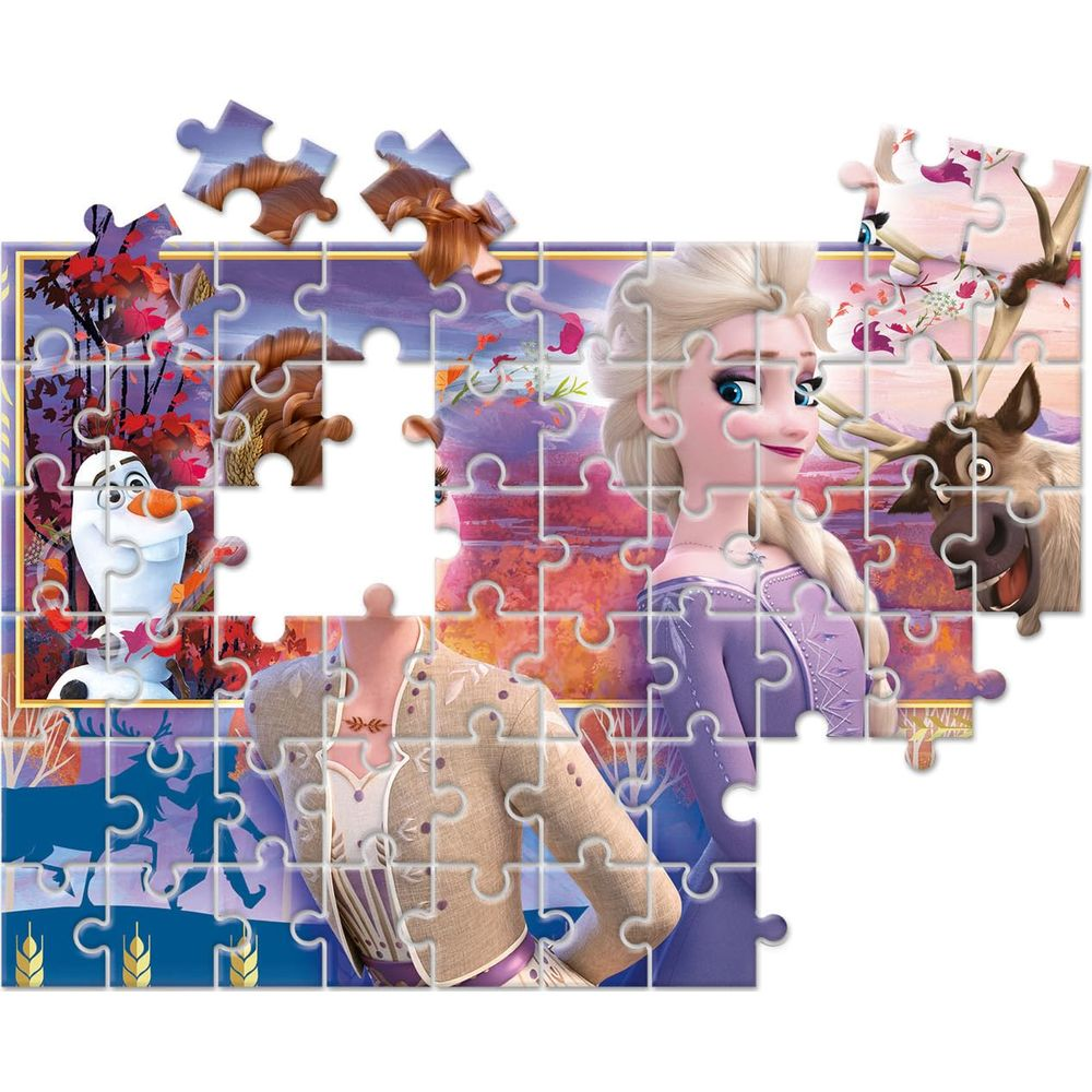 Elsa, Olaf i Sven na puzzlach z fioletowym niebem i jesiennymi liśćmi.