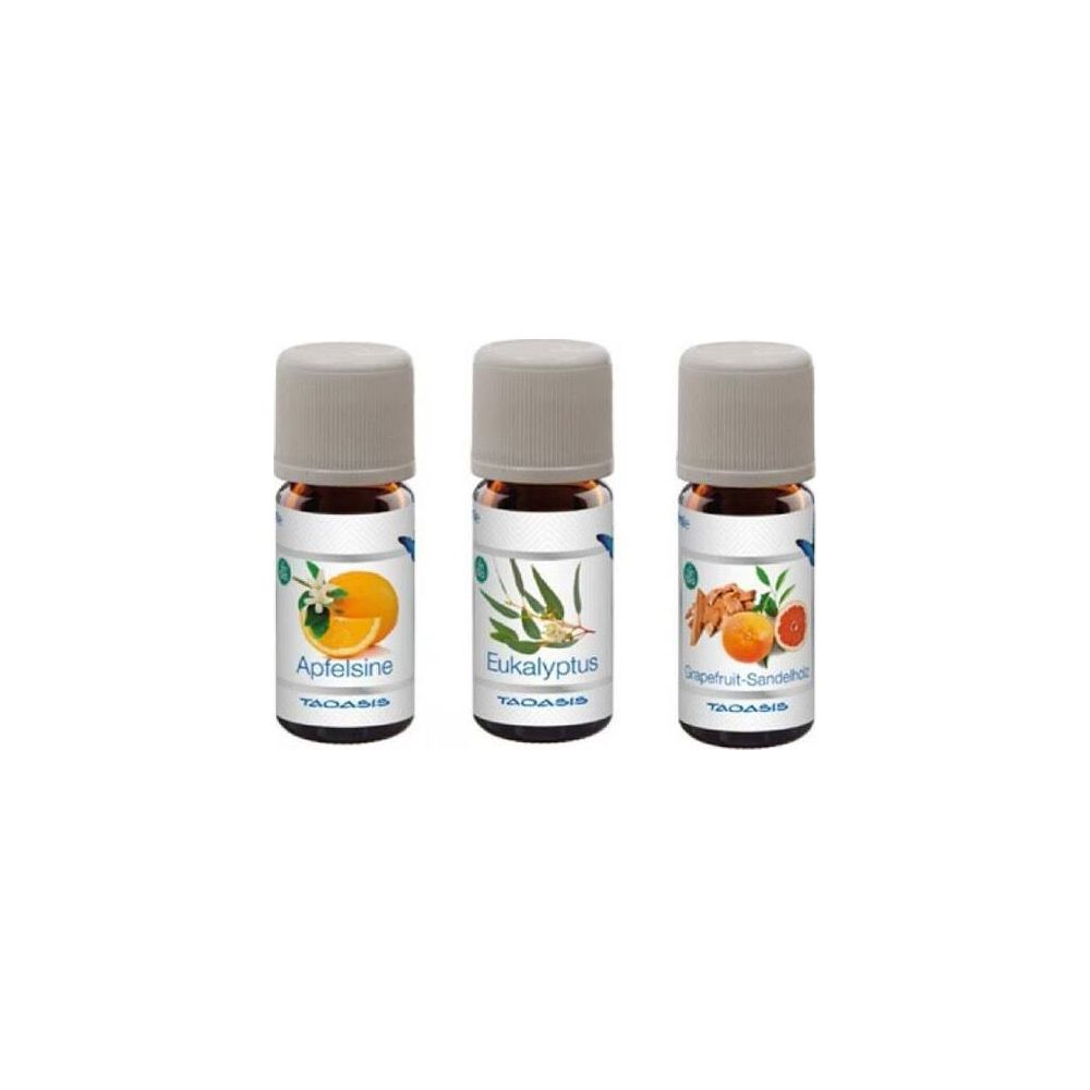 Drei kleine Flaschen mit ätherischen Ölen: Orange, Eukalyptus und Grapefruit.
