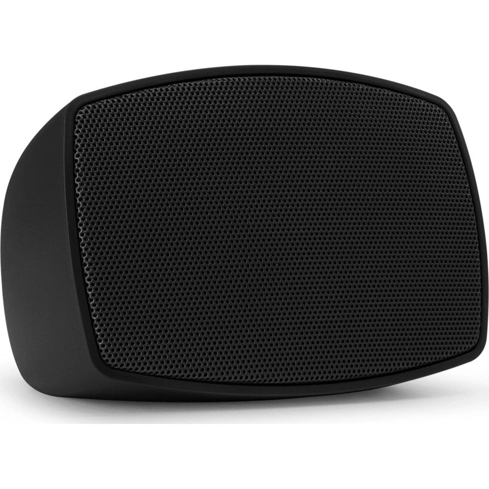Un altavoz negro con rejilla frontal perforada.