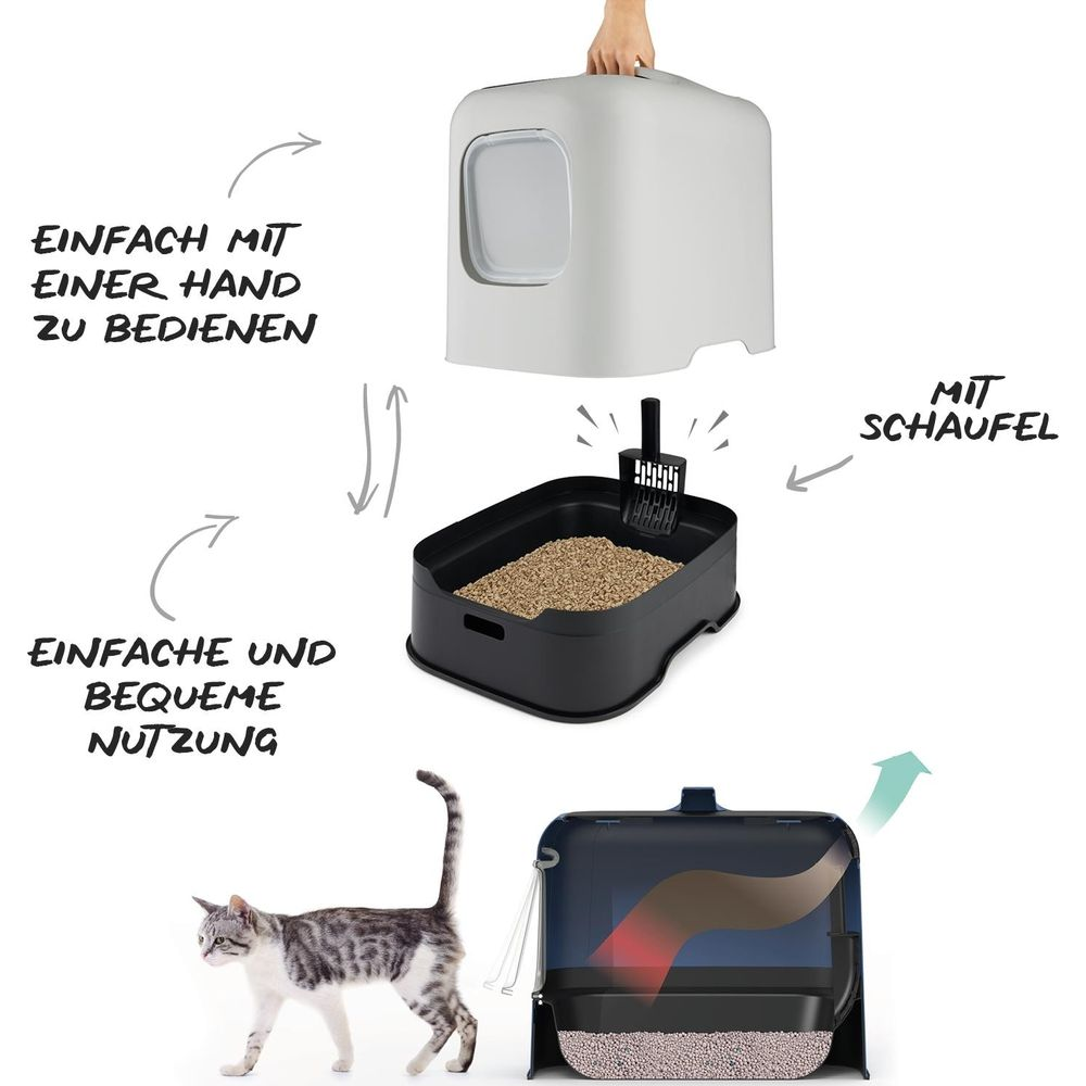 Caja de arena para gatos con capota, cajón, arena y pala. Gato al lado.