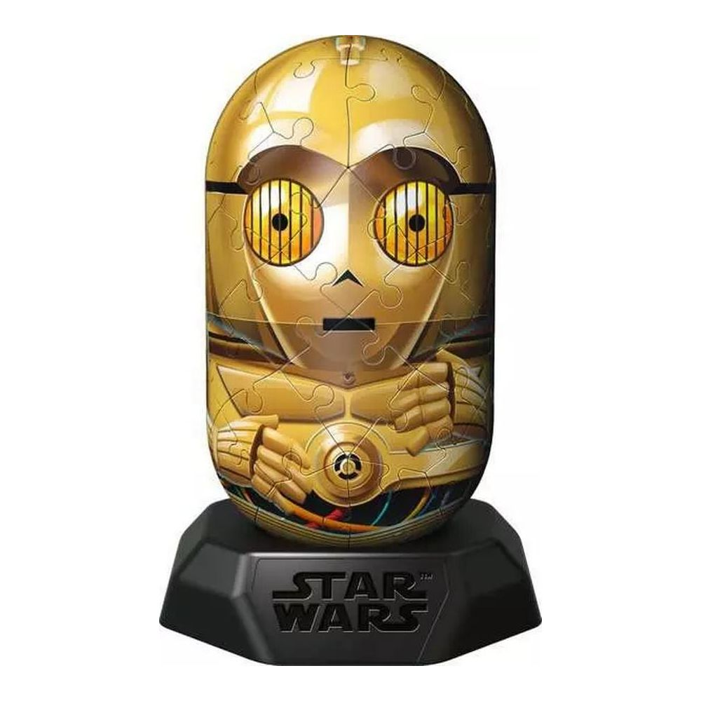 Un personaggio puzzle C-3PO dorato si erge su una base nera di Star Wars.