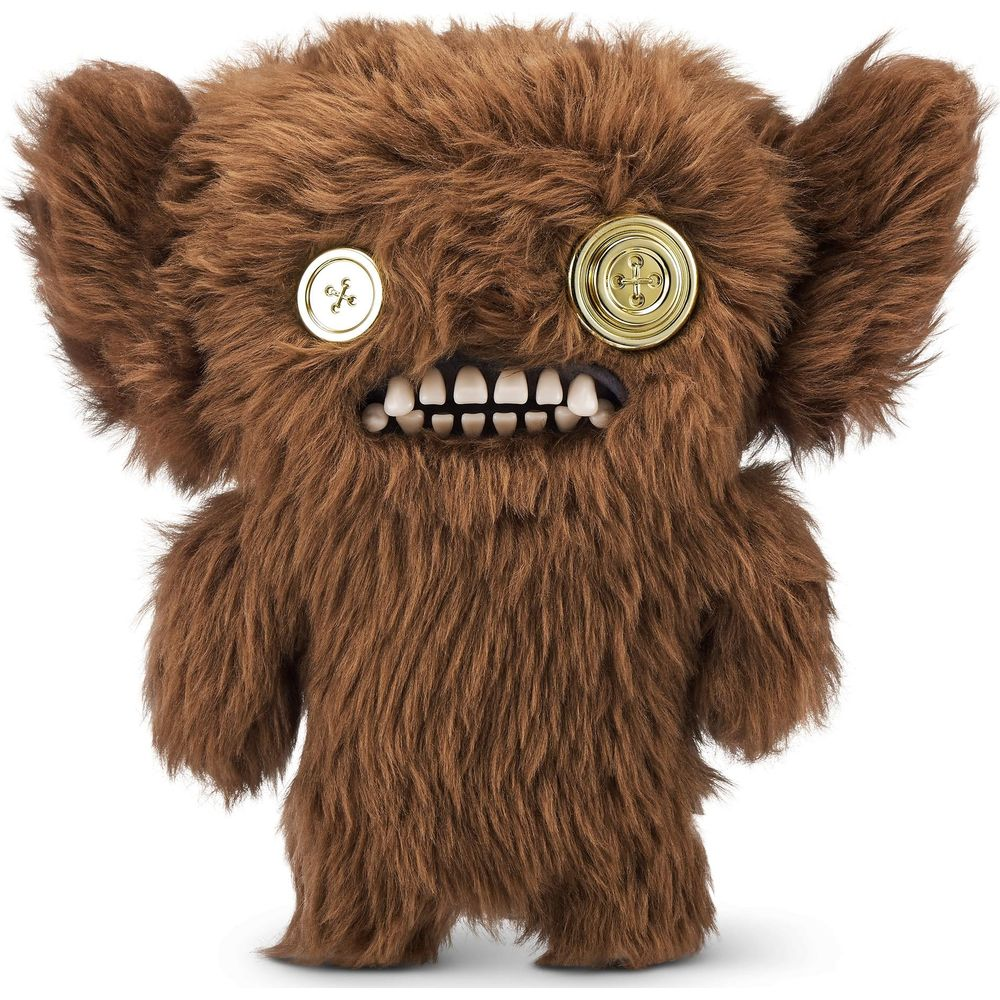 Un jouet en peluche marron et poilu avec des yeux boutonnés et des dents blanches.