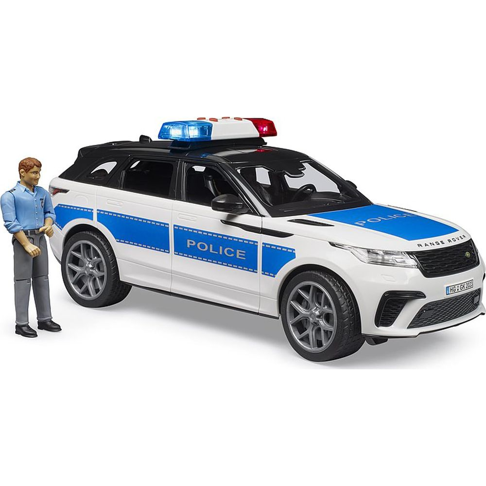 Ein Spielzeug-Polizei-SUV mit einer daneben stehenden Figur. Das Auto ist weiß mit blauen Streifen und 'POLICE'-Schriftzug.