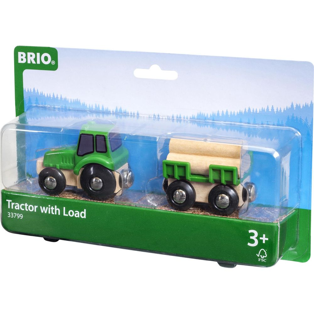 Ein grüner BRIO Traktor Spielzeug mit Holzanhänger in Verpackung.
