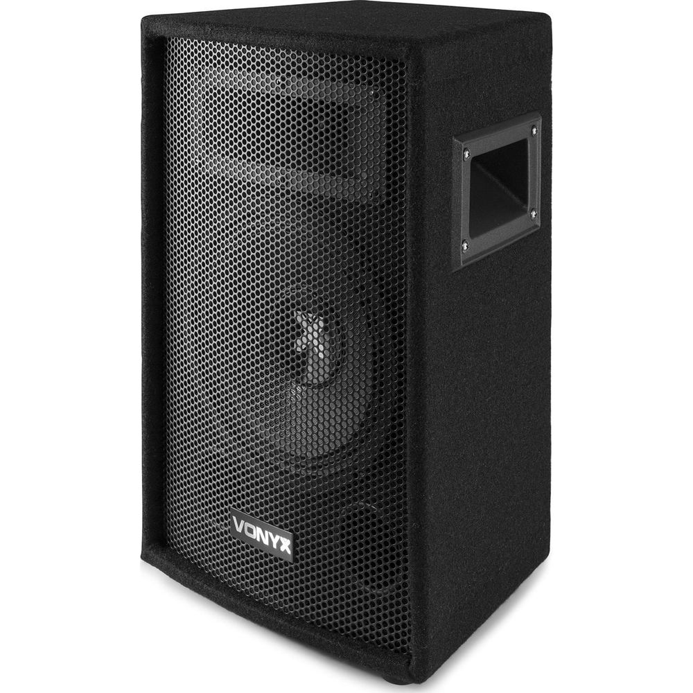 Caja de altavoz negra con rejilla y asa.