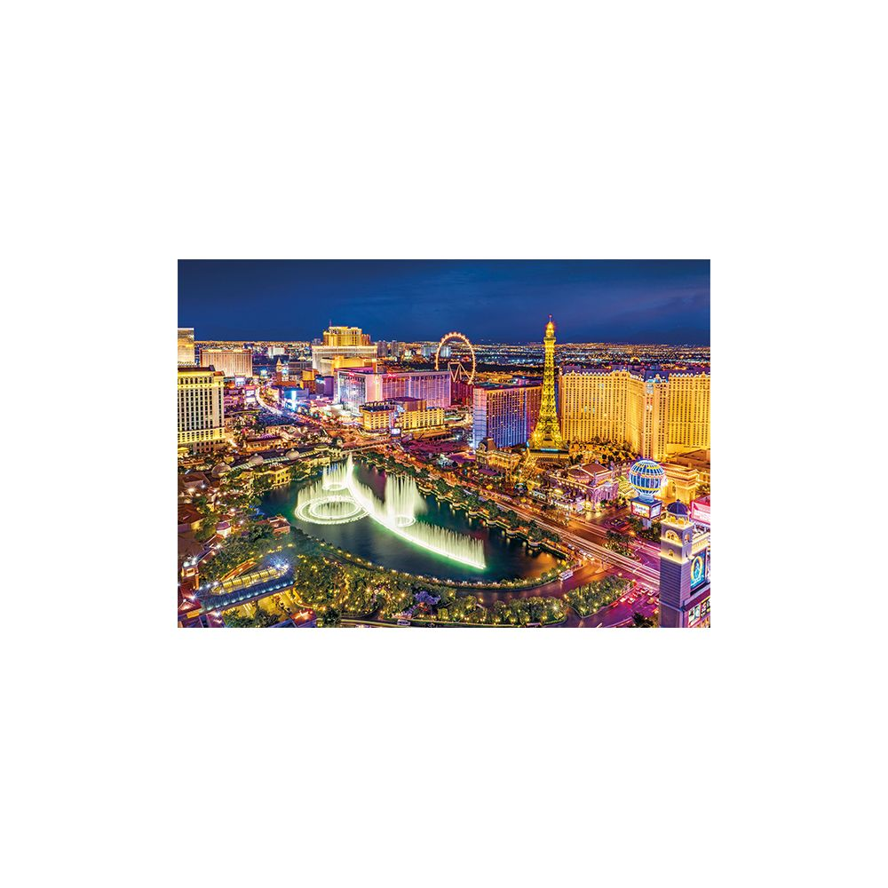 Las Vegas nocą z oświetloną Wieżą Eiffla, diabelskim młynem i fontannami.