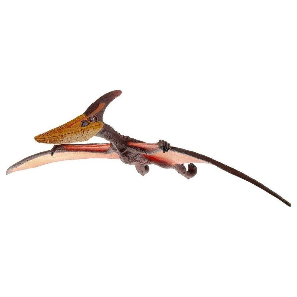 Een speelgoed Pterodactylus met bruin lichaam en gele snavel vliegt.