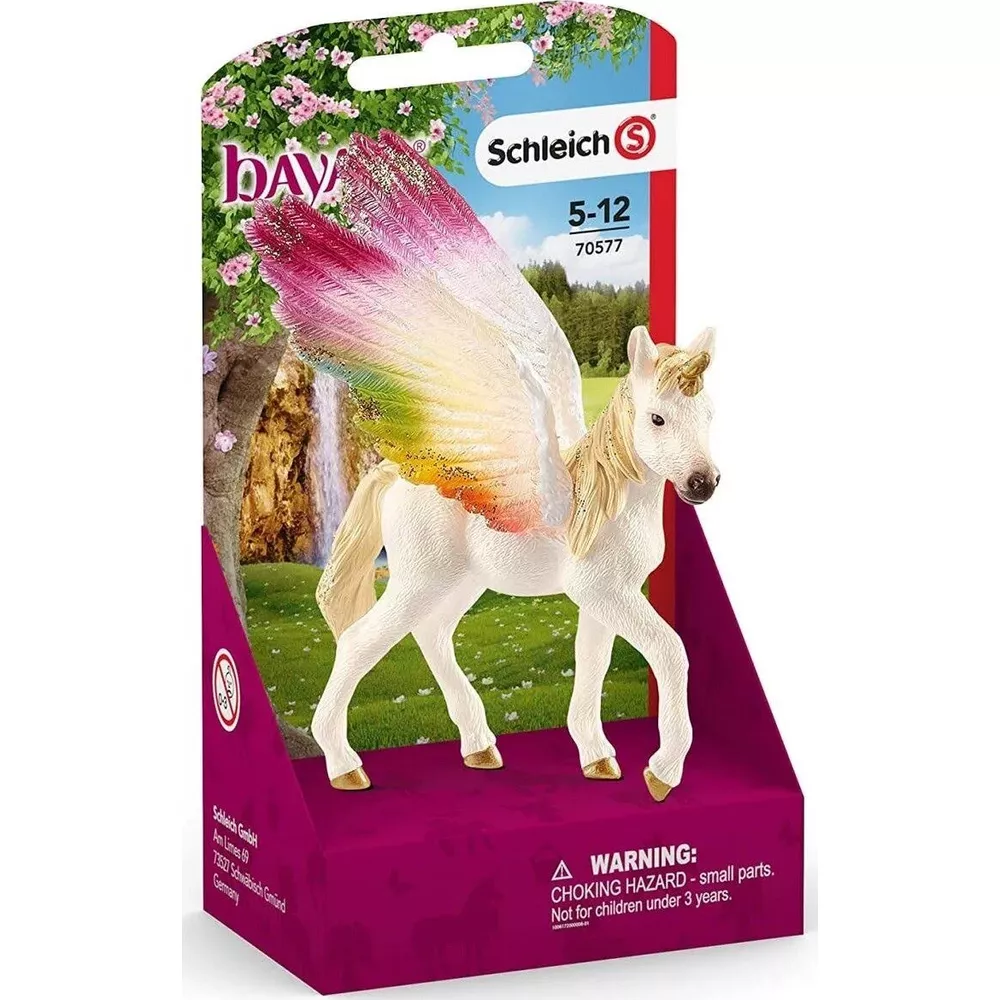 Un jouet Pégase Schleich blanc aux ailes colorées dans son emballage.