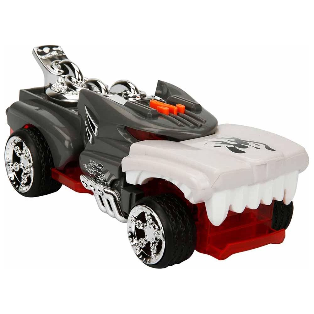 Un coche de juguete gris con dientes de tiburón y diseño de llama.