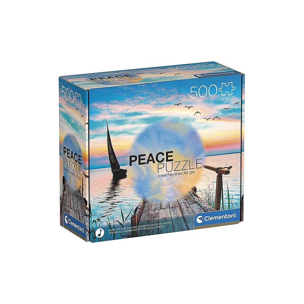 Scatola di un puzzle da 500 pezzi con barca a vela, molo e tramonto.