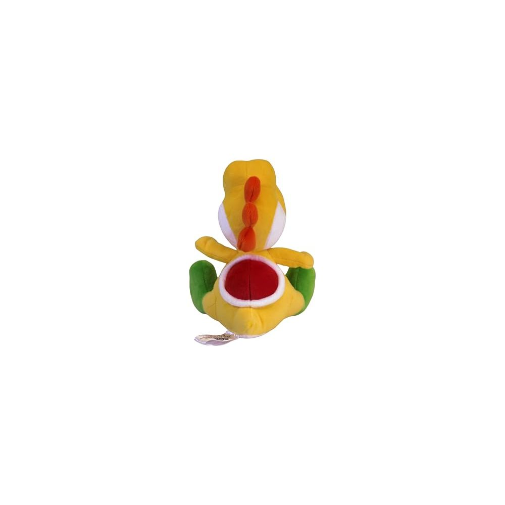 Ein gelber Yoshi-Plüsch mit roten Akzenten sitzt da.