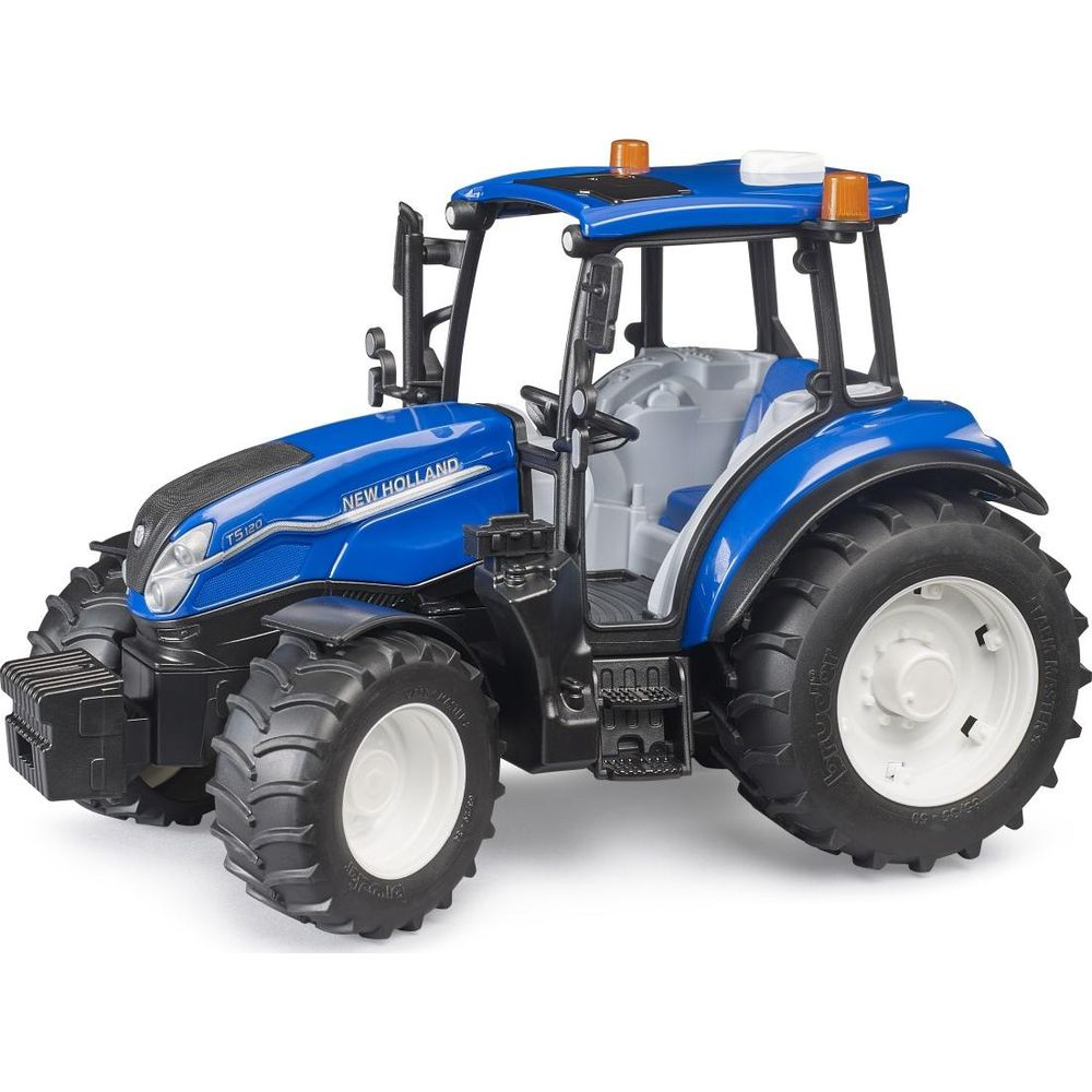 Ein blauer Spielzeugtraktor mit großen Reifen und "New Holland" Schriftzug.