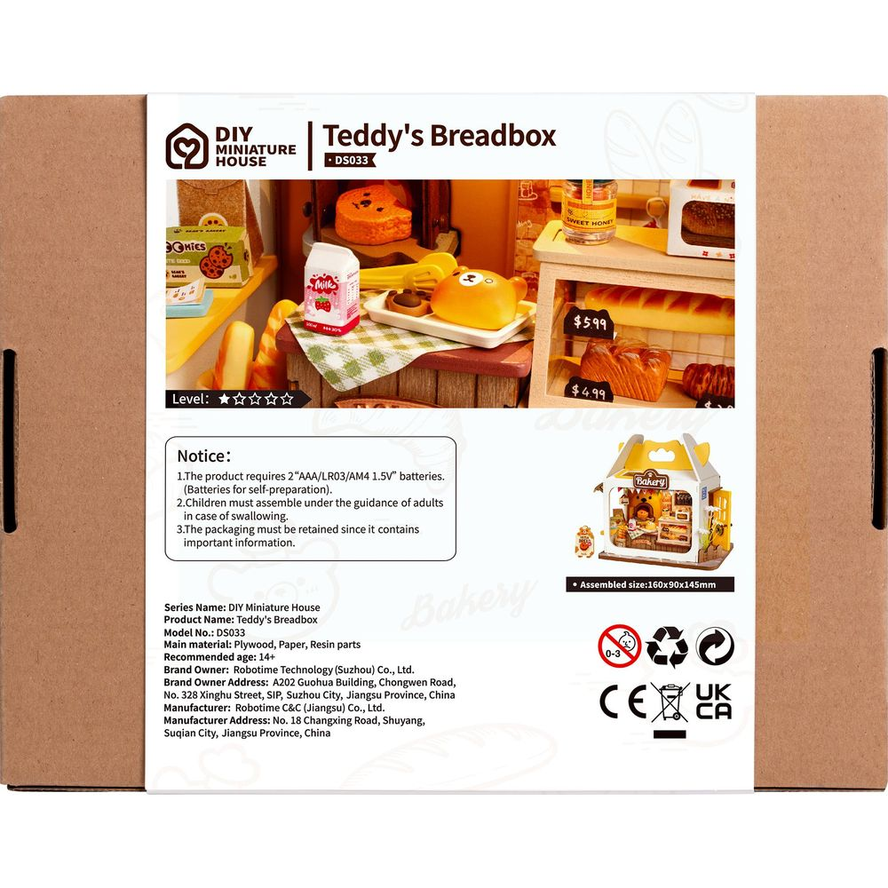 Set panetteria in miniatura a tema orsetto, con pane, latte e cartellini prezzo.