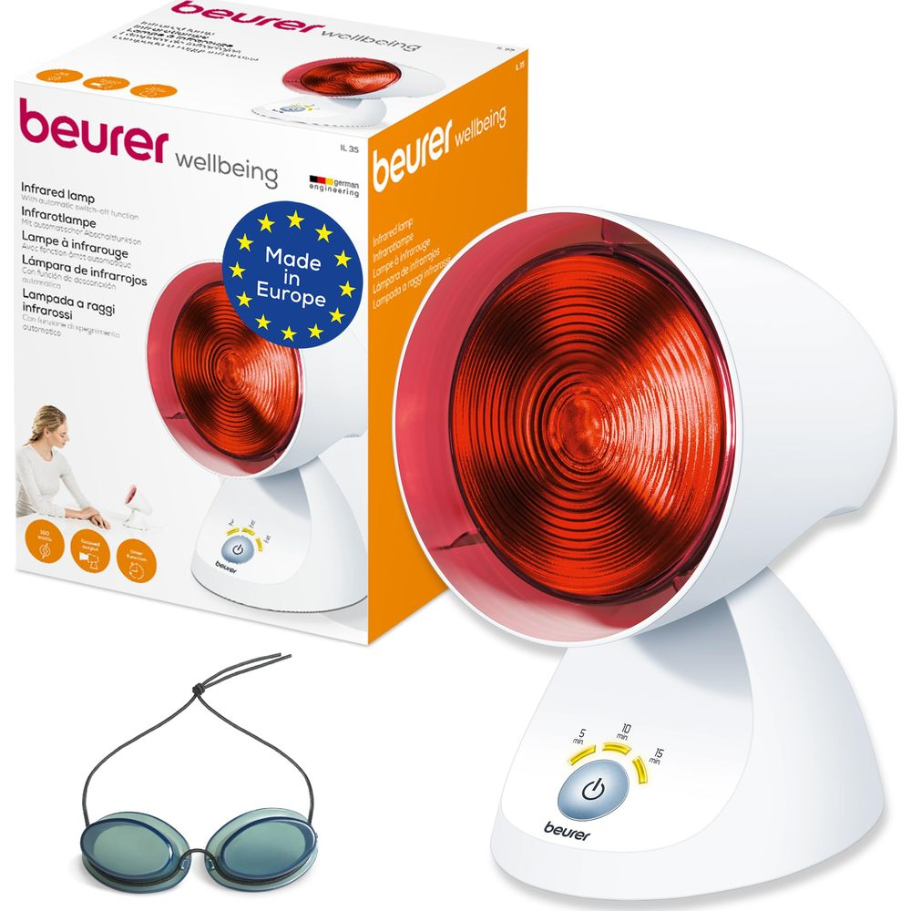 Una lámpara infrarroja blanca con bombilla roja y gafas protectoras.