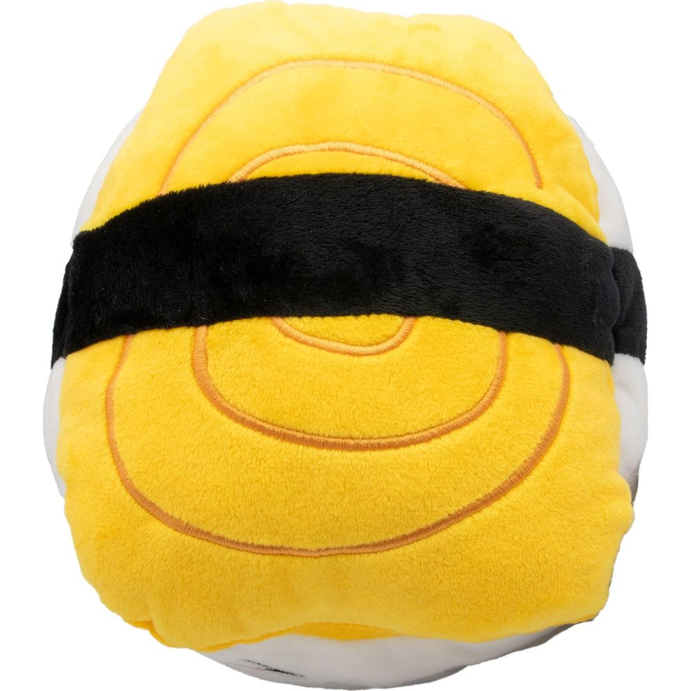 Un peluche rotondo giallo con strisce bianche e nere.