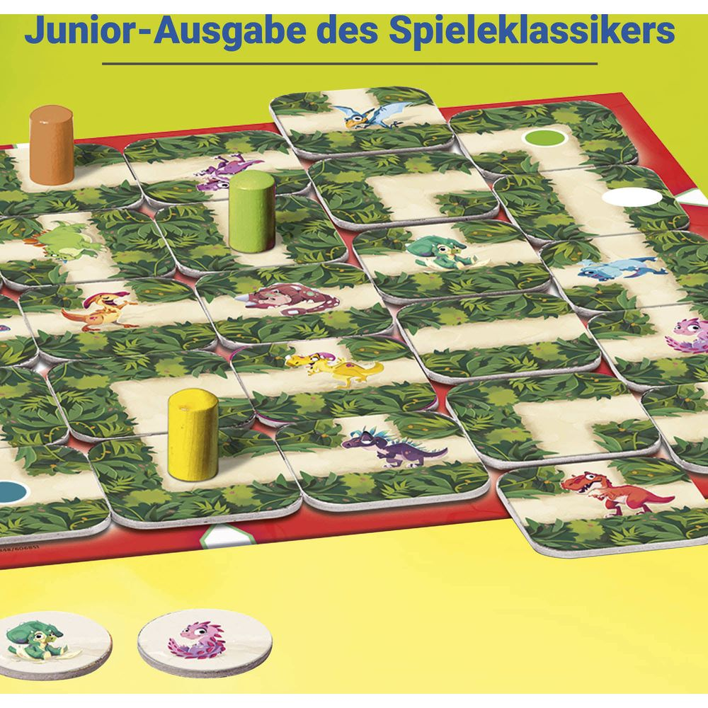 Ein Brettspiel mit grünen und braunen Spielfiguren auf einer Dschungel-Spielbahn.