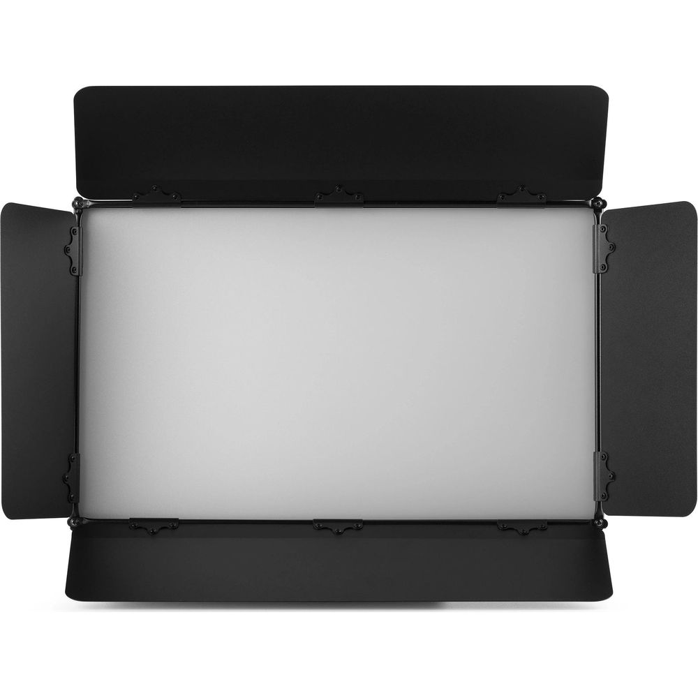 Un difusor de luz negro con solapas abatibles, que ilumina un panel gris claro.