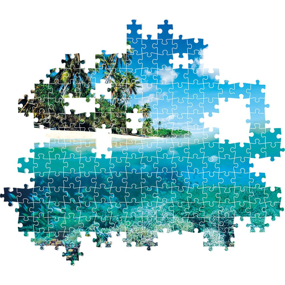 Puzzle przedstawiające plażę z palmami i podwodną rafę.