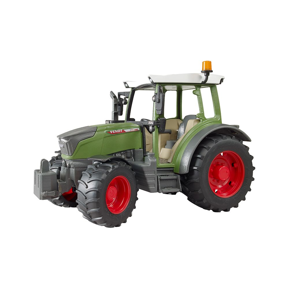 Ein grüner Spielzeugtraktor mit roten Felgen, detailliert.