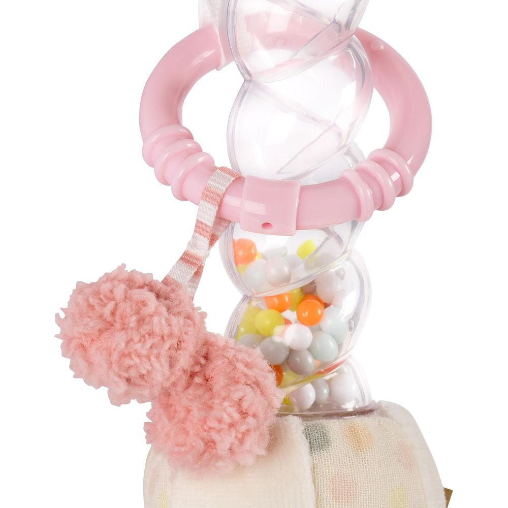 Sonaglio per neonato con manico rosa, corpo a tubo trasparente e perline colorate.