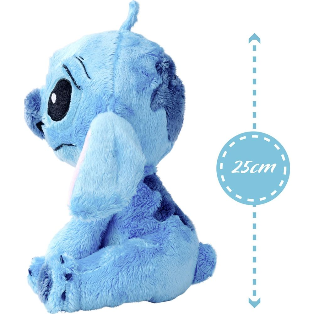 Niebieska pluszowa zabawka Stitch siedzi, ma 25 cm.