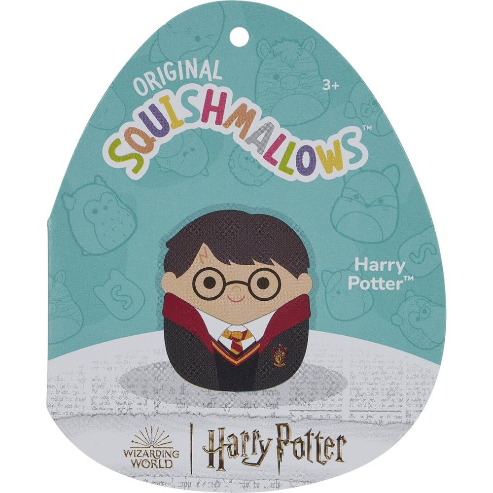 Harry Potter Squishmallow mit Brille, rot-goldene Uniform auf türkiser Verpackung.