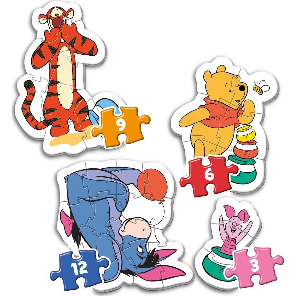 Personaggi di Winnie the Pooh Tigro, Ih-Oh, Pooh e Pimpi come pezzi del puzzle.