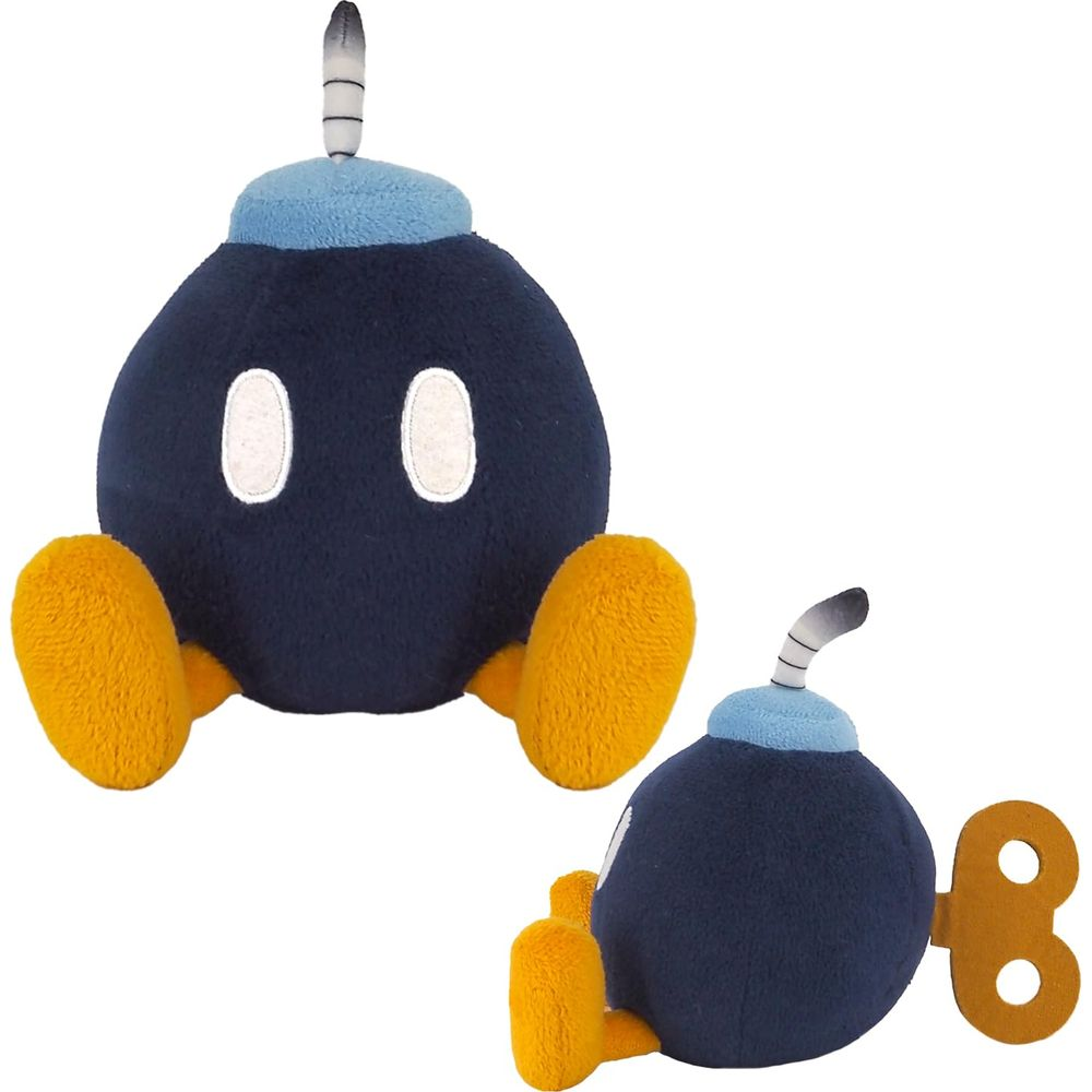 Zwei dunkelblaue Bob-ombs Plüschtiere mit gelben Füßen und blauen Kappen.