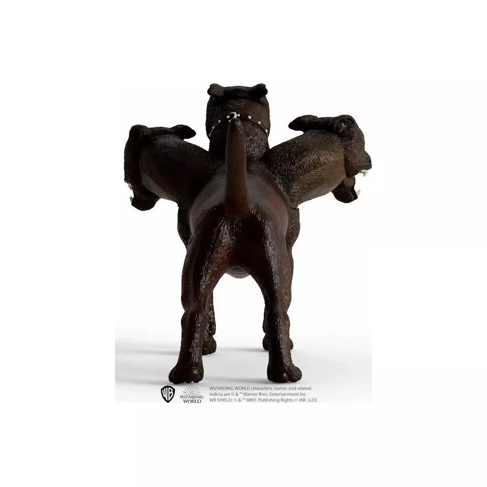 Ciemny, trójgłowy pies na białym tle.