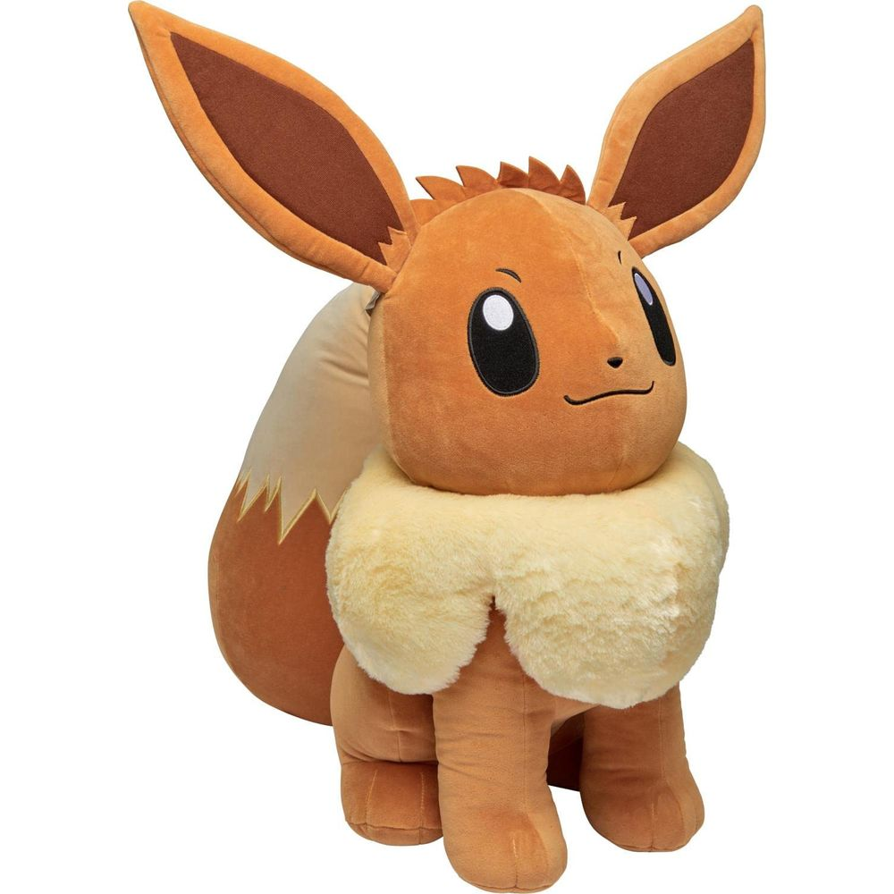 Une peluche Evoli marron est assise avec de grandes oreilles et un col moelleux.