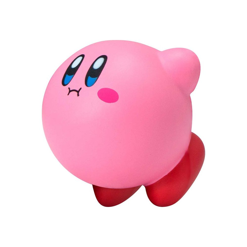 Une figurine rose de Kirby aux yeux bleus et pieds rouges sur fond blanc.