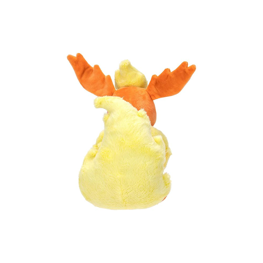 Ein gelber und orangefarbener Plüschtier-Charakter mit Flügeln und Flammen.