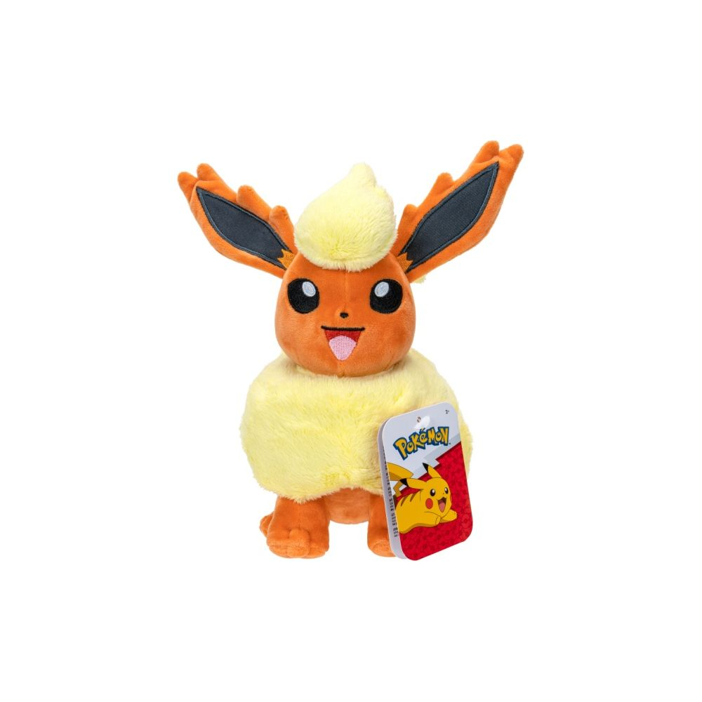 Ein orangefarbener Plüschtier-Pokémon mit gelbem Fell und spitzen Ohren, das auf einem Tag mit Pikachu sitzt.
