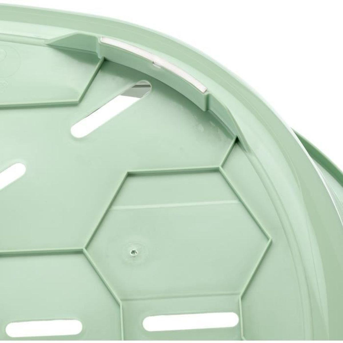 Contenedor de plástico verde con patrón hexagonal y ranuras.
