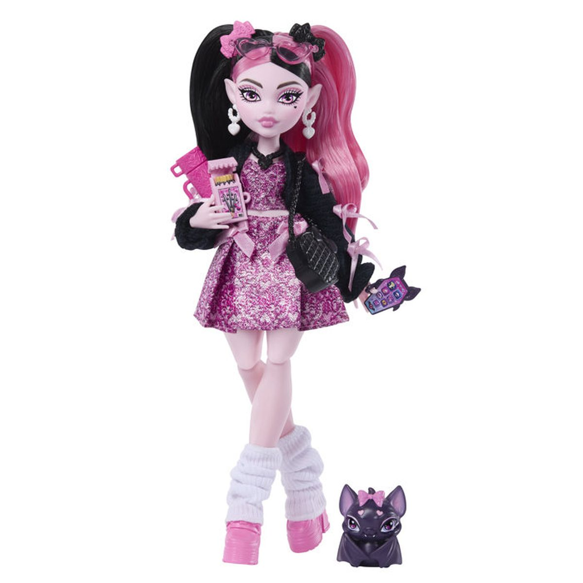 Eine Puppe mit schwarzen und pinken Haaren, pinkem Kleid, schwarzer Jacke und einem Fledermaustier.