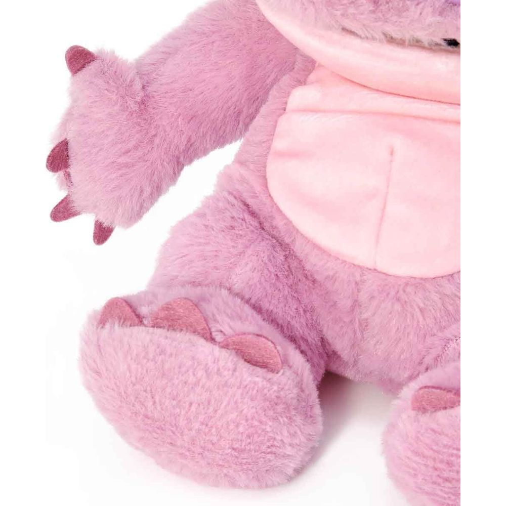 Puszysta, lawendowa pluszowa zabawka z różowymi akcentami na uszach i stopach.